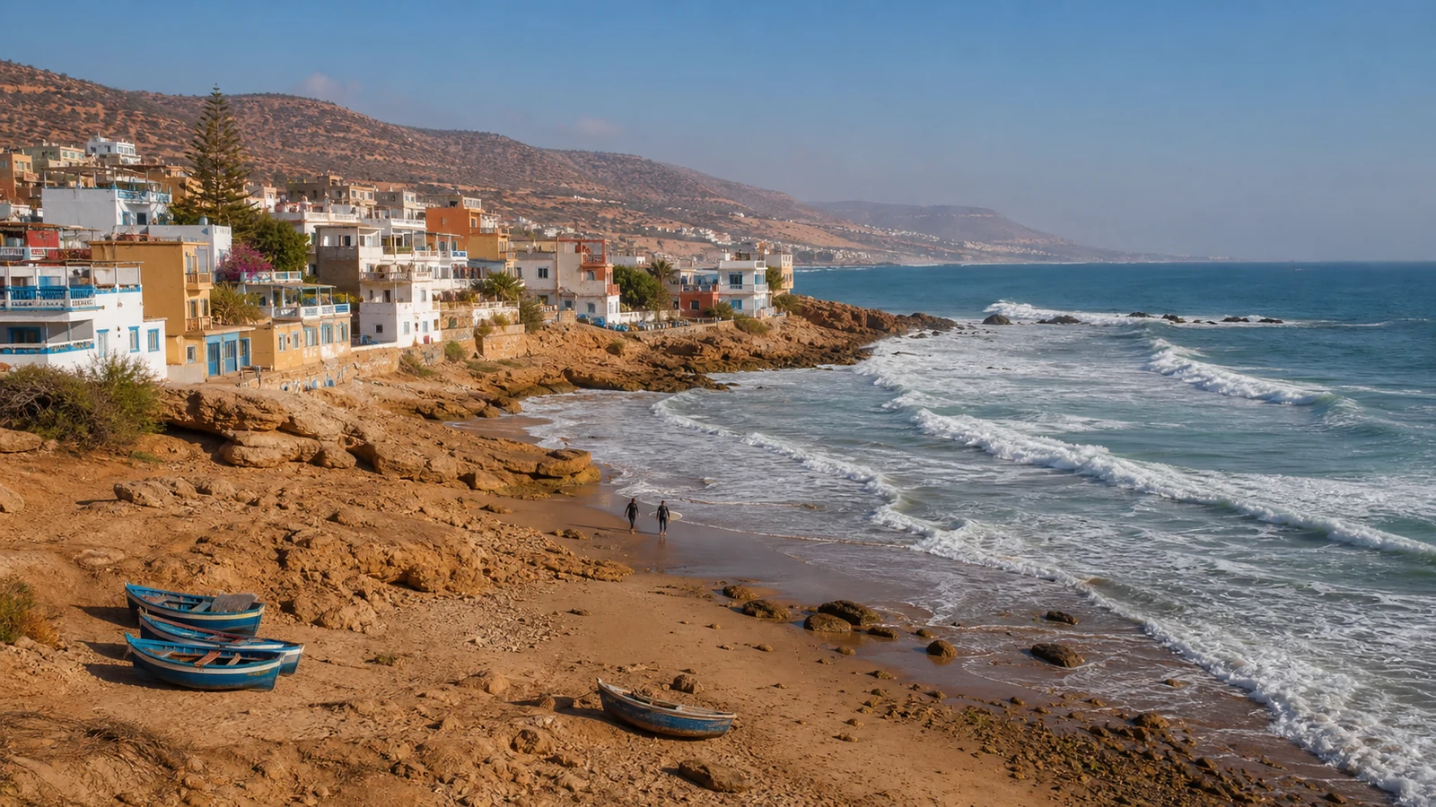 Taghazout village, fishing boats and Atlantic surf north of Agadir