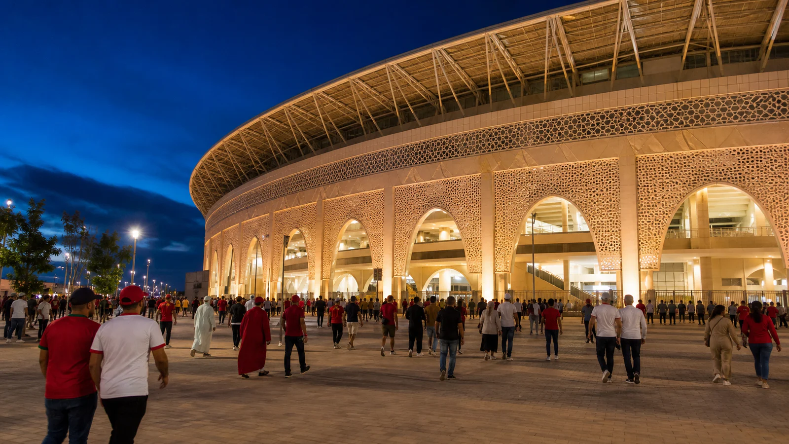 Supporters leaving a Morocco-inspired stadium in Fez after an evening football match