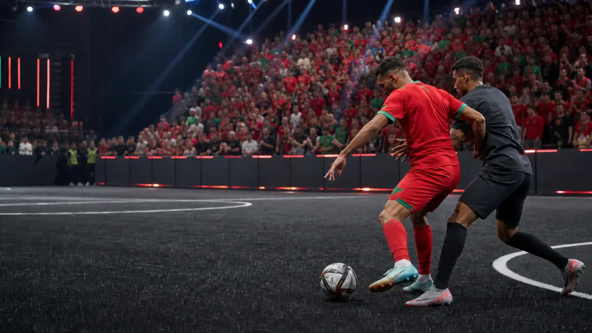 Moroccan supporters at a seven-a-side football match in an indoor arena
