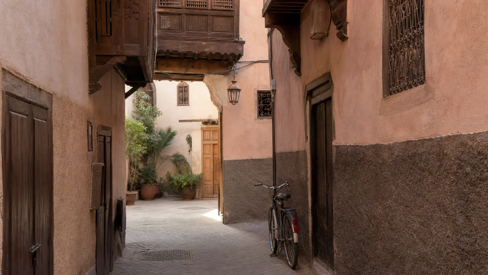 Quiet passage with wooden balconies in Marrakech’s historic Mellah