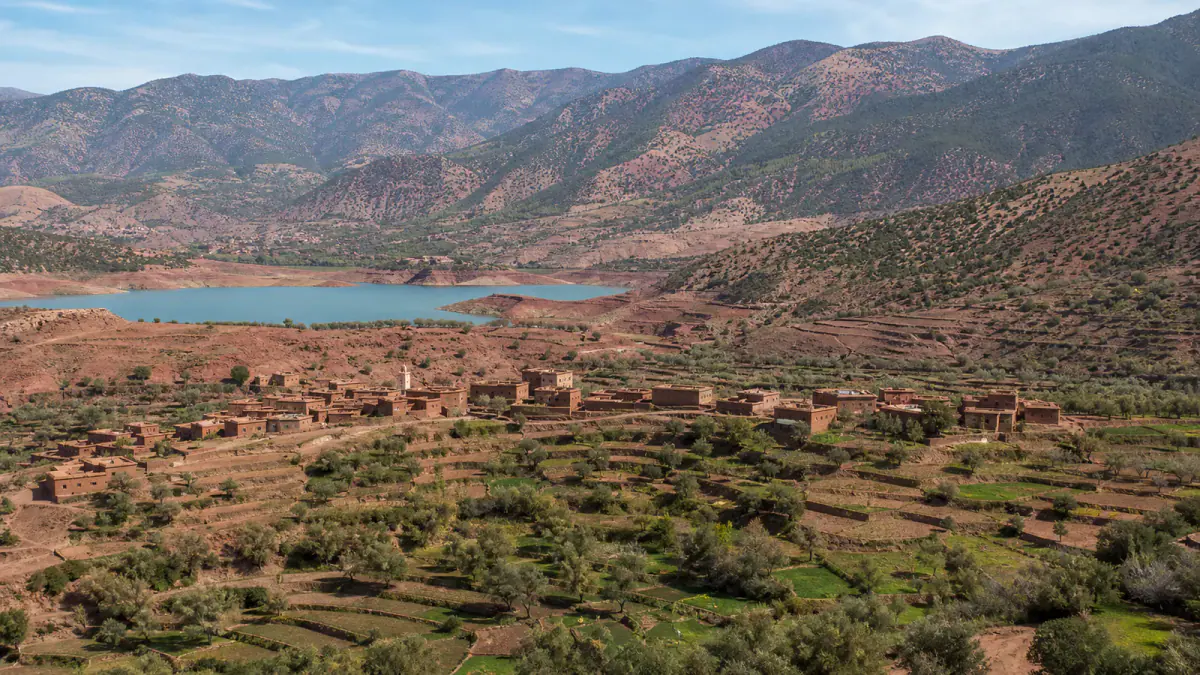 Ouirgane Valley reservoir, terraced fields and mountain village in Morocco