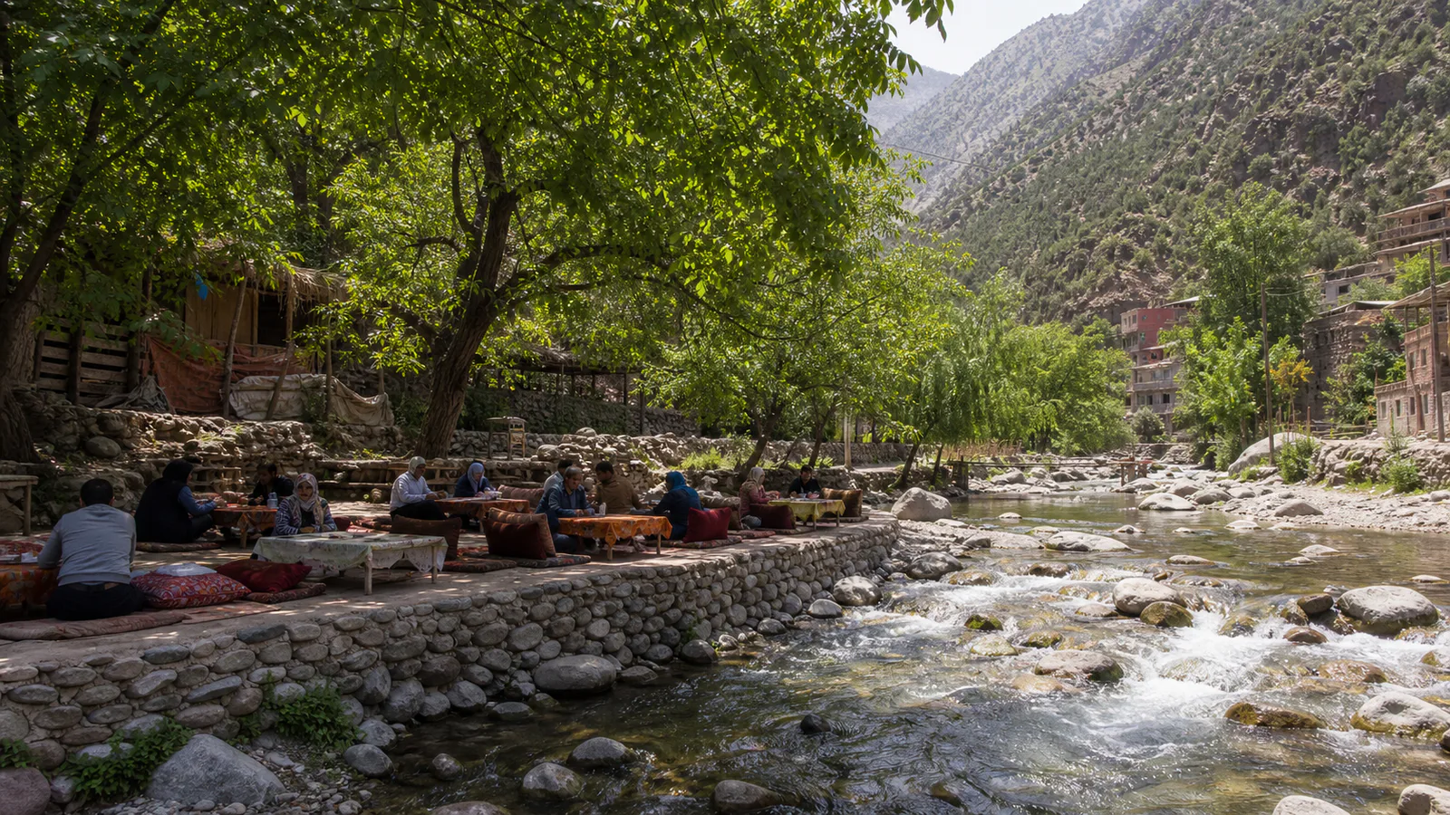 Families and travelers eating beside the river in Ourika Valley